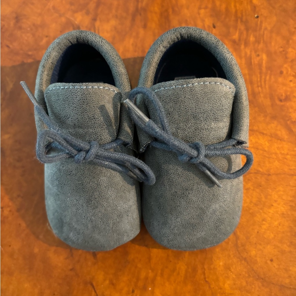 Baby Blue Moccasins, size 12-18 months. Never worn.